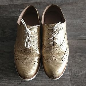 Gold Cole Haan metallic oxfords
